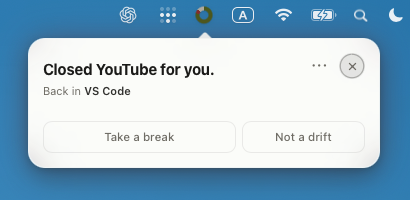 A close native drifty Extreme Nudge card over the same clean macOS desktop, with the menu-bar productivity ring, confirming that YouTube was closed and focus returned to VS Code